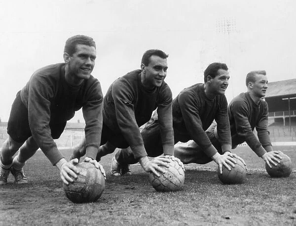 Blackburn Rovers football players do press-ups during training session in preparation for