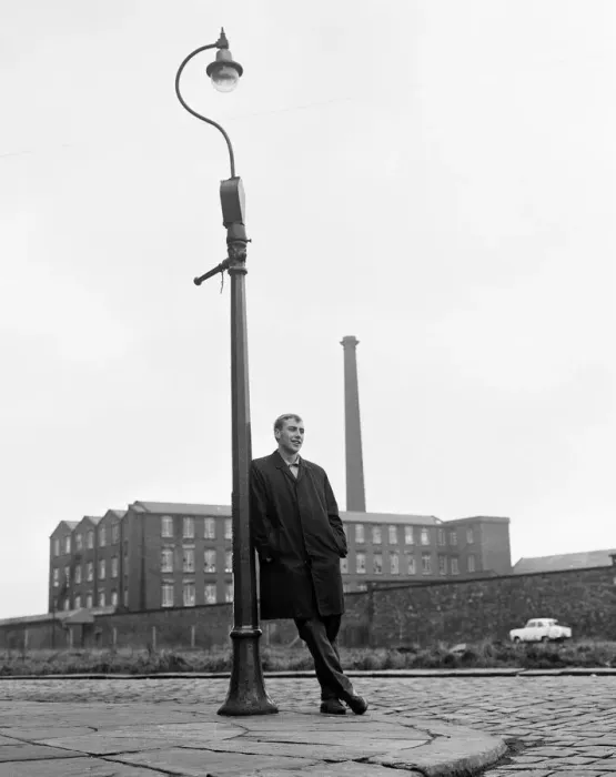 Framed Print : Blackburn Rovers forward John Byrom walking down the street where he lives Framed Print : Blackburn Rovers forward John Byrom walking down the street where he lives