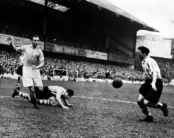 Blackpool v Southampton Stanley Matthews (left) with Peter Sillett (on ground)