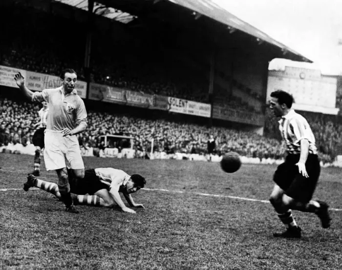 Framed Print : Blackpool v Southampton Stanley Matthews (left) with Peter Sillett (on ground) Framed Print : Blackpool v Southampton Stanley Matthews (left) with Peter Sillett (on ground)