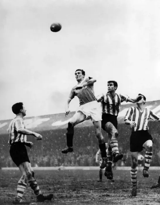 Framed Print : Blackpools Daddy-long-legs-inside-left Dave Durie-outleaps Wednesday defenders Peter