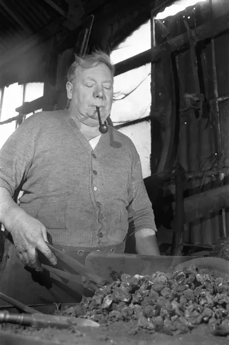 Framed Print : Blacksmith Horace Tubby Lovegrove seen here at work at his forge Framed Print : Blacksmith Horace Tubby Lovegrove seen here at work at his forge