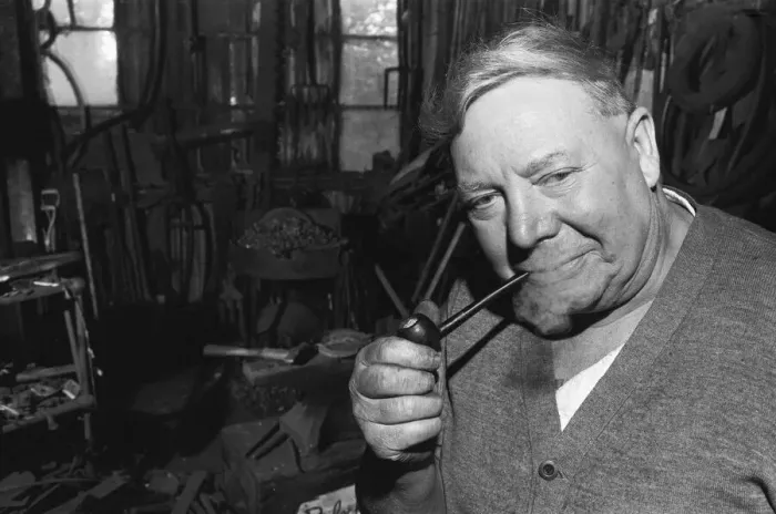 Framed Print : Blacksmith Horace Tubby Lovegrove seen here at work at his forge Framed Print : Blacksmith Horace Tubby Lovegrove seen here at work at his forge
