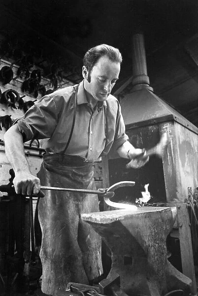 Blacksmith Joe Baty, of Hexham making horseshoes