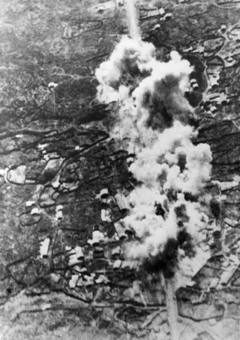 Framed Print : Blasting the road to Messina. Cluster of bombs bursts directly on the main road of Framed Print : Blasting the road to Messina. Cluster of bombs bursts directly on the main road of
