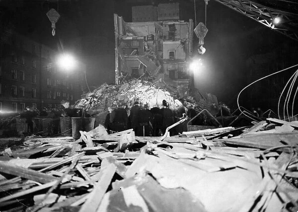 A block of flats wrecked in an air raid. Second World War. February 1944