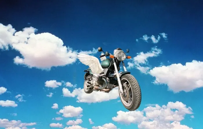 Framed Print : BMW 1100 motorbike with wings in the clouds 1998