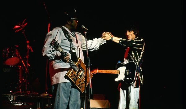 Bo Diddley and Ronnie Wood on stage at the Capital Radio Music Festival. 28th June 1988