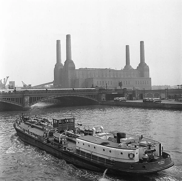 Boat named BP Spirit passes Battersea Power Station Circa 1954