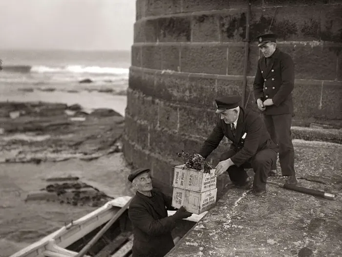 Framed Print : Boatman Old Alick delivers the holly topped boxes of Christmas gifts from the families