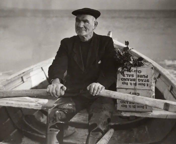 Framed Print : Boatman Old Alick rows the holly-topped Christmas boxes from the families ashore out to Framed Print : Boatman Old Alick rows the holly-topped Christmas boxes from the families ashore out to