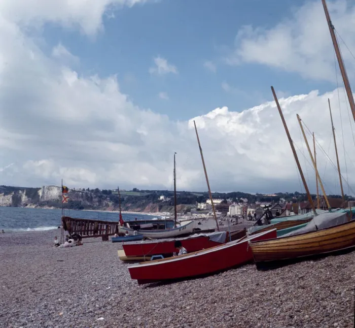 Framed Print : Boats on the beach in the small seaside town of Seaton on the South Devon coast