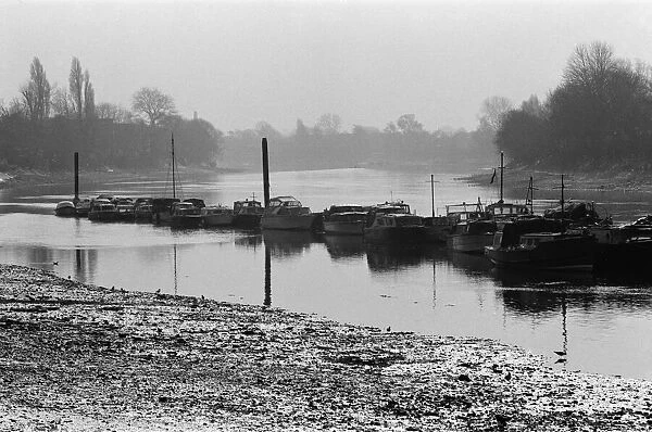 Boats on the River Thames in Kew, London. 5th March 1971