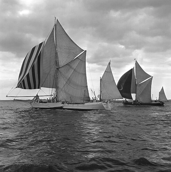Boats Thames sailing barge race June 1962. two boats race side by side under