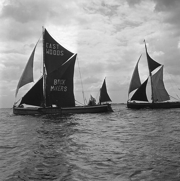 Boats Thames sailing barge race, June 1962. Barges under full sail off