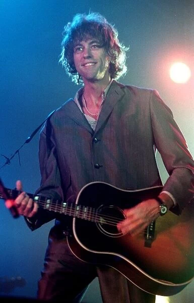 Bob Geldof playing at Ross On Wye Festival August 1999 Sir Bob Geldof playing