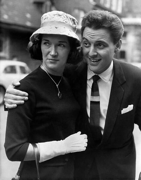 Bob Monkhouse and his wife Elizabeth seen leaving the Law Courts after giving evidence