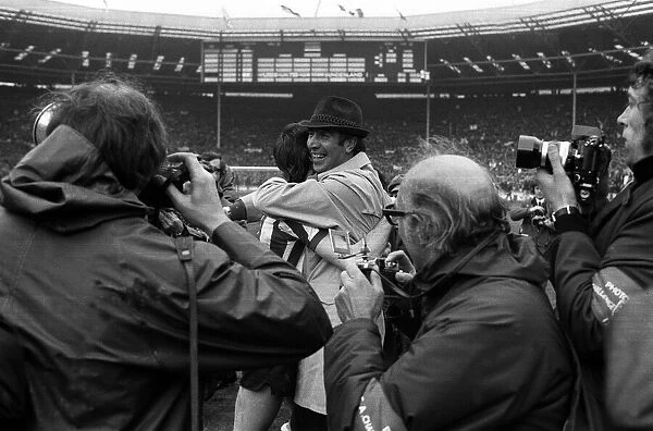 Bob Stokoe hugs team member after Sunderland won the FA cup final 1973 against Leeds