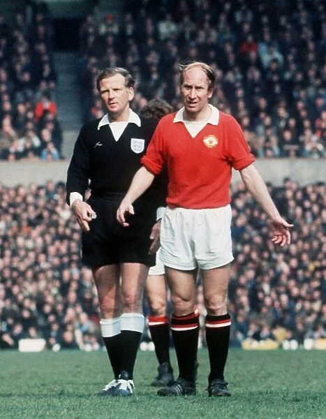Bobby Charlton 1973 Manchester United Manchester City football standing in front of