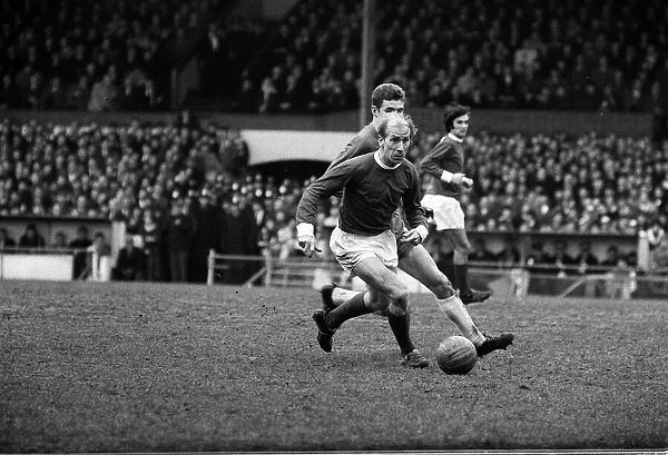 Bobby Charlton in action for Manchester United against Chelsea at Stamford Bridge