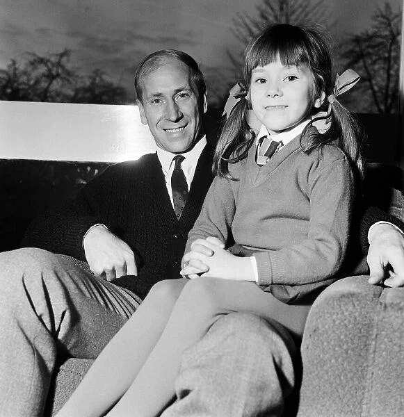 Bobby Charlton with his daughter Suzanne, after finding out that the Queen has named one