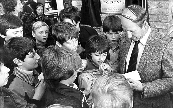 Bobby Charlton gave away hundreds of bunches of daffodils to youngsters for Mother