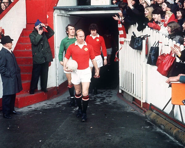 Bobby Charlton, Manchester United football player, leading out the team from tunnel