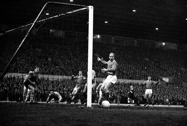 Bobby Charlton of Manchester United misses from close range during the match against West
