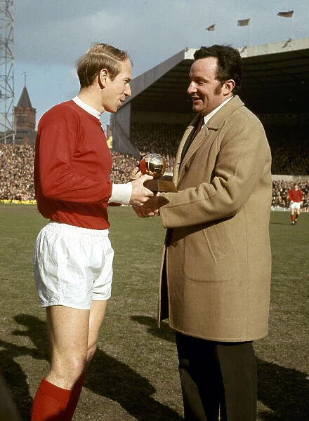 Bobby Charlton of Manchester United receives the European Footballer of the Year Award