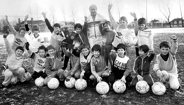 Bobby Charlton with youngsters at Soccer School at Monkton Stadium