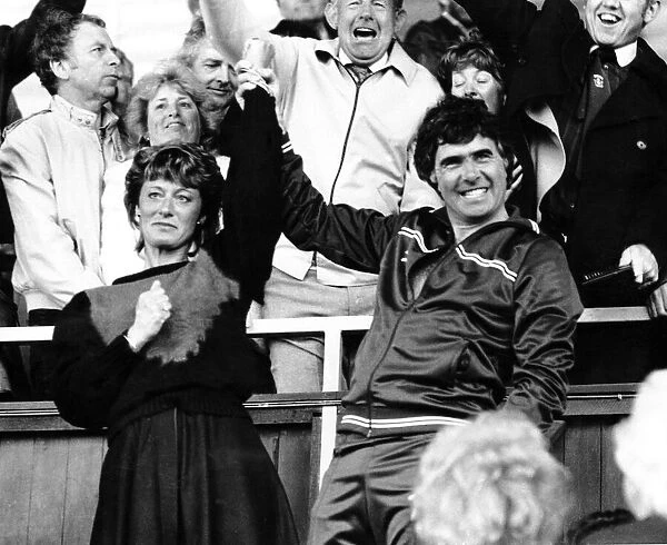 Bobby Gould and his wife accept the fans acclaim at a Coventry v Norwich football match