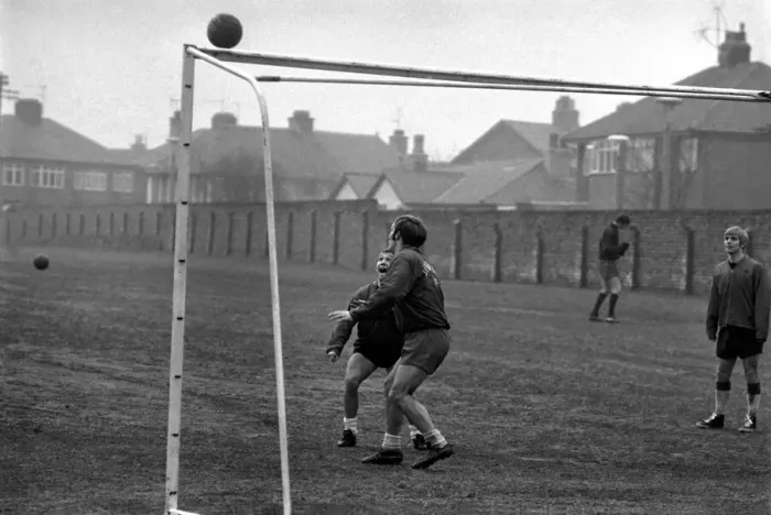 Framed Print : Bobby Graham, Evans and Ross who was acting as goalkeeper during a spot of training Framed Print : Bobby Graham, Evans and Ross who was acting as goalkeeper during a spot of training