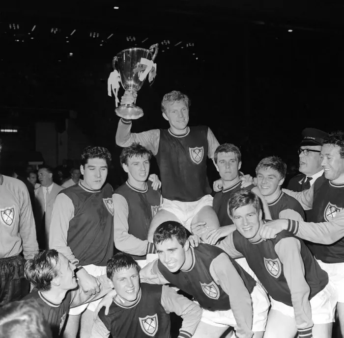 Framed Print : Bobby Moore being carried by West Ham teammates after winning European Cup Winners Cup