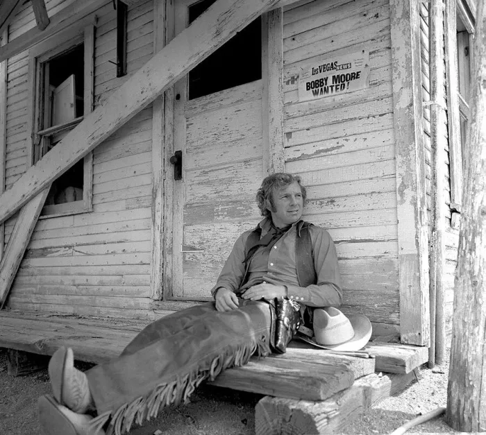 Framed Print : Bobby Moore dressed as cowboy in America taken when West Ham were on their Tour of