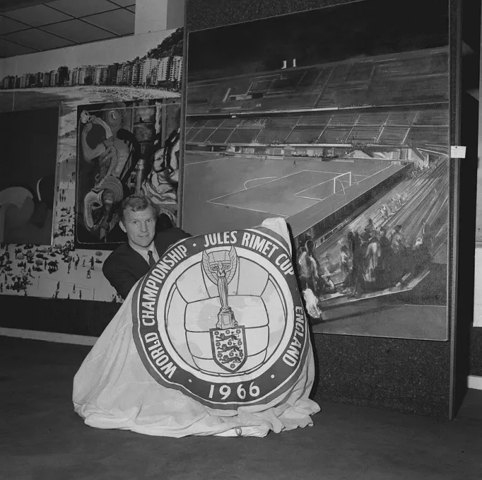 Framed Print : Bobby Moore football captain of England poses with the 1966 World Cup flag 25  /  3  /  66