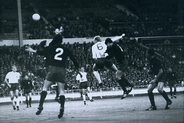 Bobby Moore heads the ball towards the Mexican goal during Englands match against Mexico