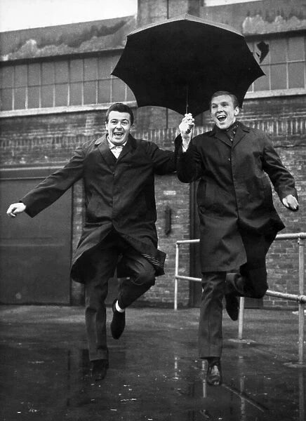 Bobby Moore and Johnny Byrne seen here leaving West Ham