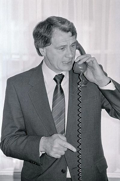 Bobby Robson England manager pictured on telephone April 1985