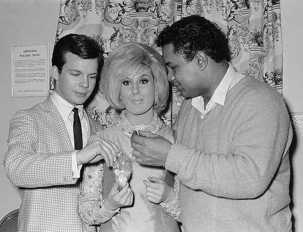 Bobby Vee, Dusty Springfield and Big Dee Irwin share the sweets thrown out during