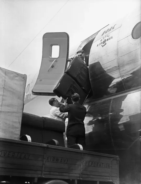 Framed Print : BOCA Boeing Strato Cruiser being adapted and loaded with supplies for flood victims in