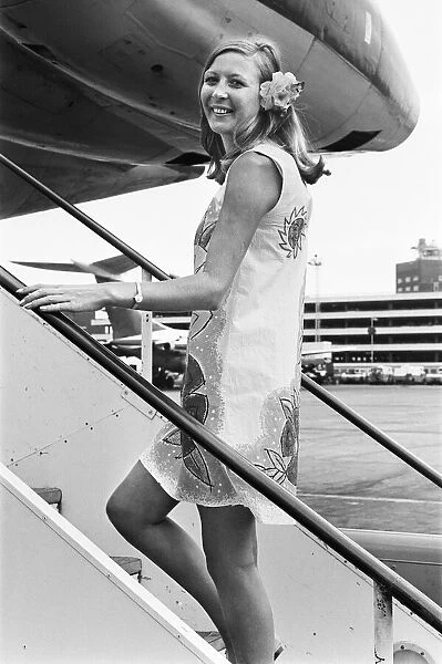 BOCA girl modelling a paper uniform, the aircraft is a Vickers VC10