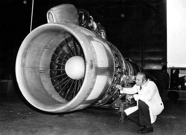 A Boeing 707 engine receiving routine maintenance at Gatwick Airport