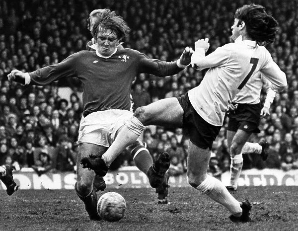 Bolton v Chelsea. Willie Morgan and David Hay go for the ball