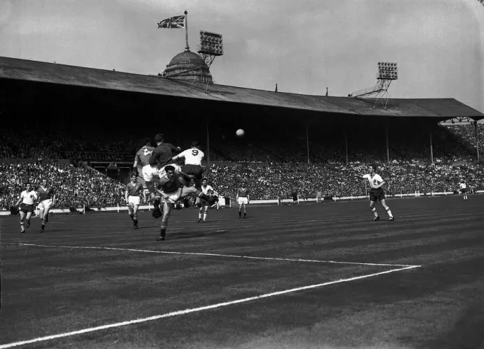 Framed Print : Bolton Wanderers and Manchester United players jump for the ball during FA cup Final Framed Print : Bolton Wanderers and Manchester United players jump for the ball during FA cup Final