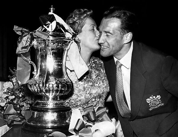 Bolton Wanderers Nat Lofthouse seen here with his wife and the FA Cup. May 1958
