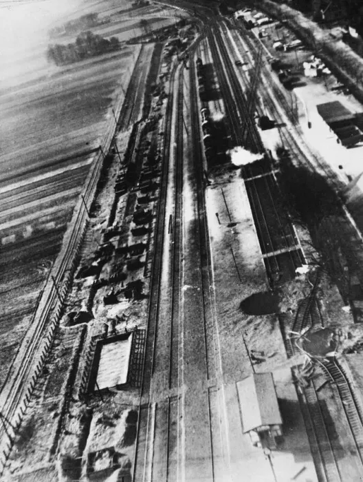 Framed Print : Bomb craters can be seen severing the central platform of the railway station Framed Print : Bomb craters can be seen severing the central platform of the railway station
