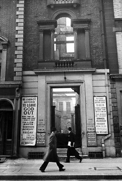 Bomb damage in Aldgate, London. Circa 1941