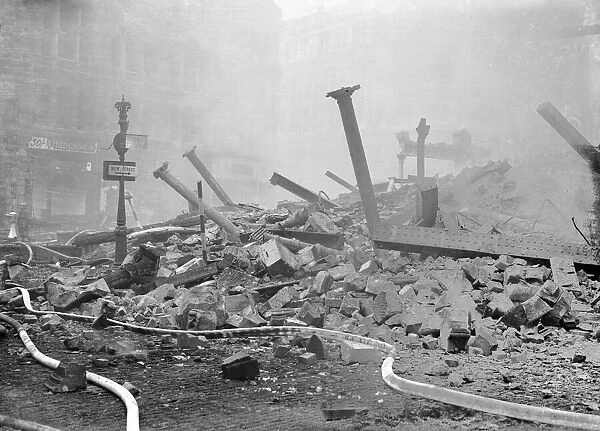 Bomb damage to Bull Ring, High Street, Birmingham, after air raid on night of 9th April