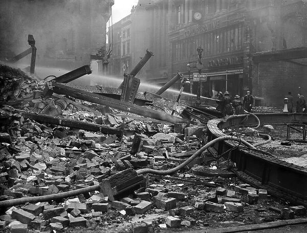 Bomb damage to High Street in Birmingham, after air raid on night of 9th April 1941