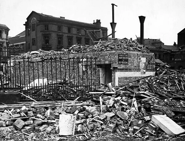 Bomb damage in Liverpool during the Second World War. A street surface shelter which